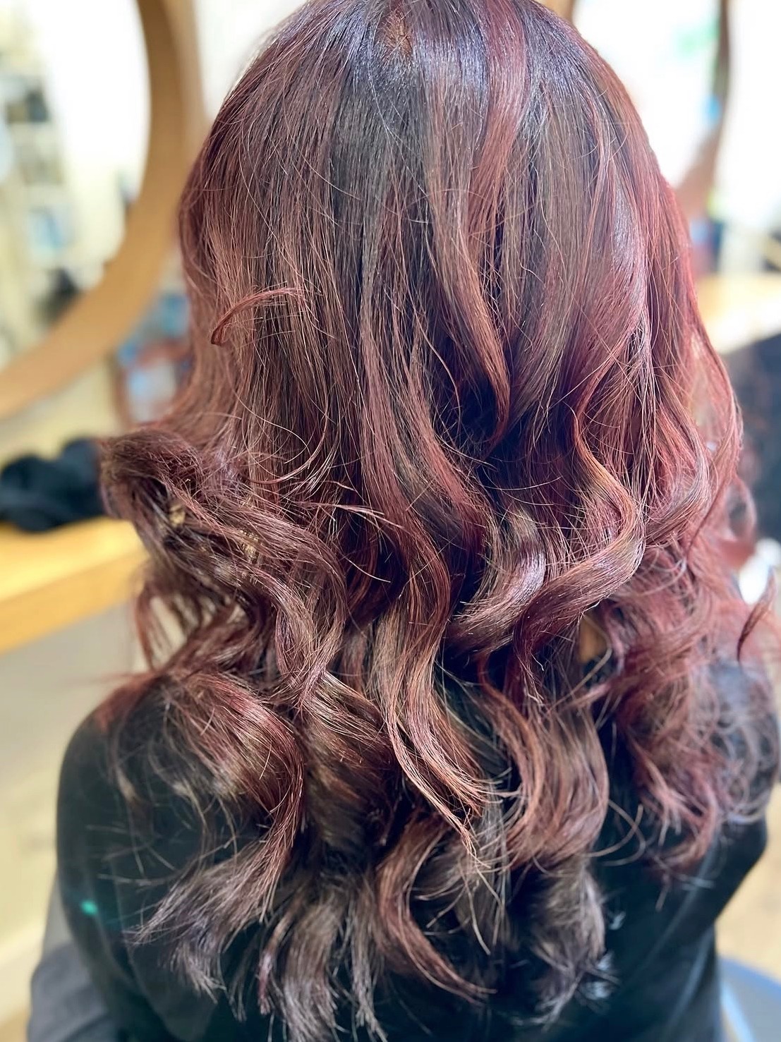Long rose-mauve waves with dimensional highlights